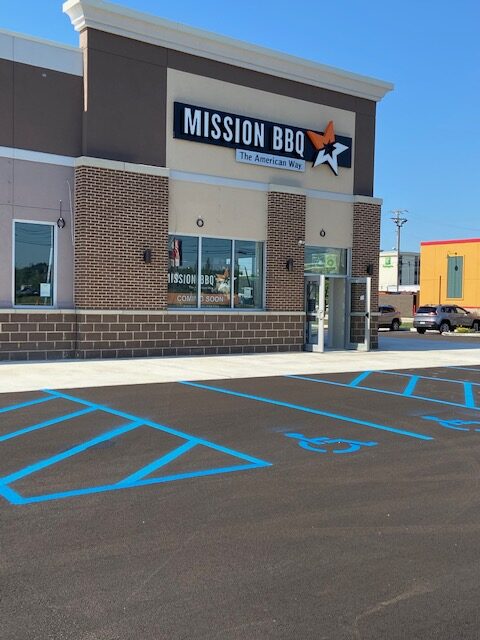 Mission BBQ parking lot with a designated handicap section painted